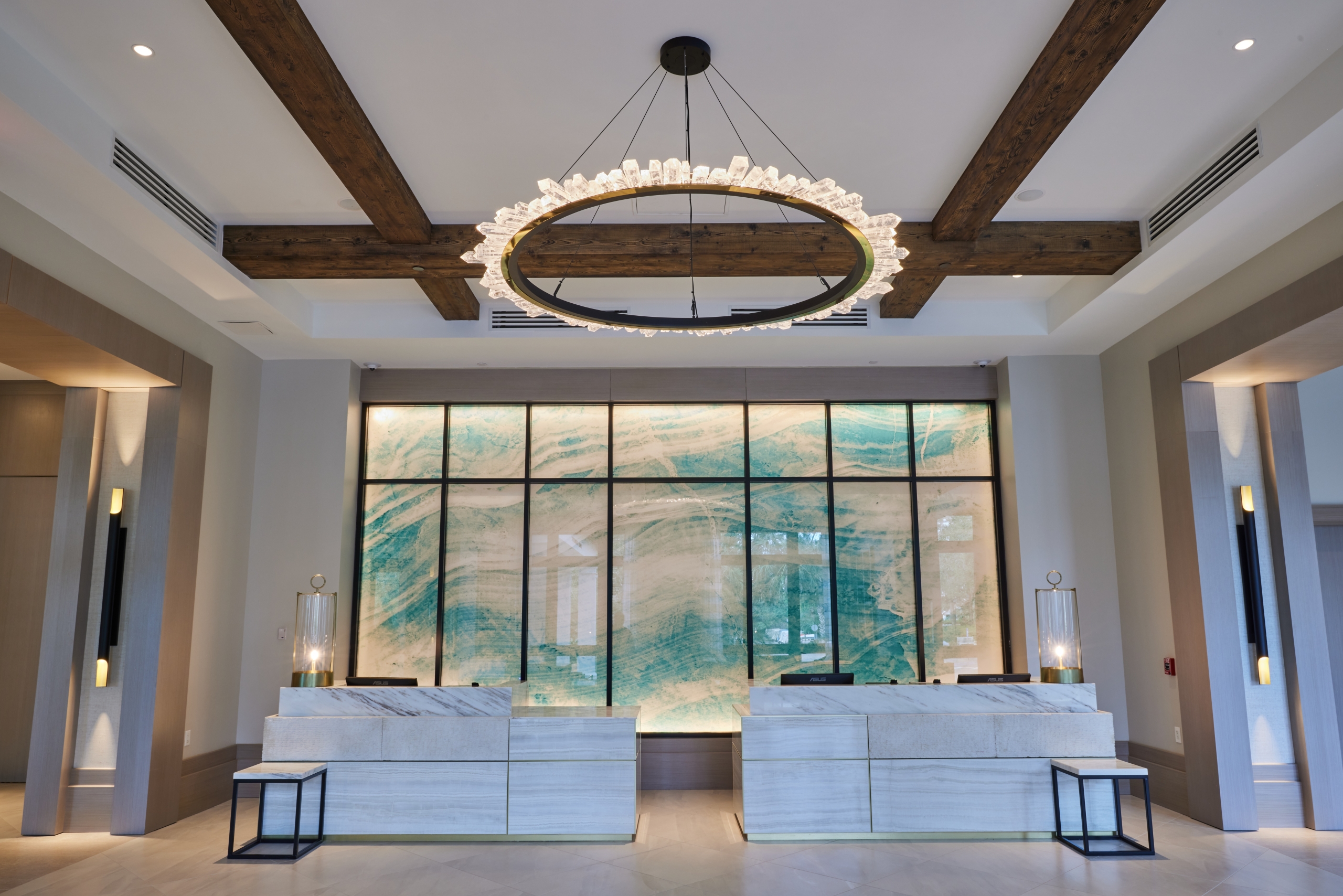 The Hotel Effie's grand, high-ceiling lobby and front desk area