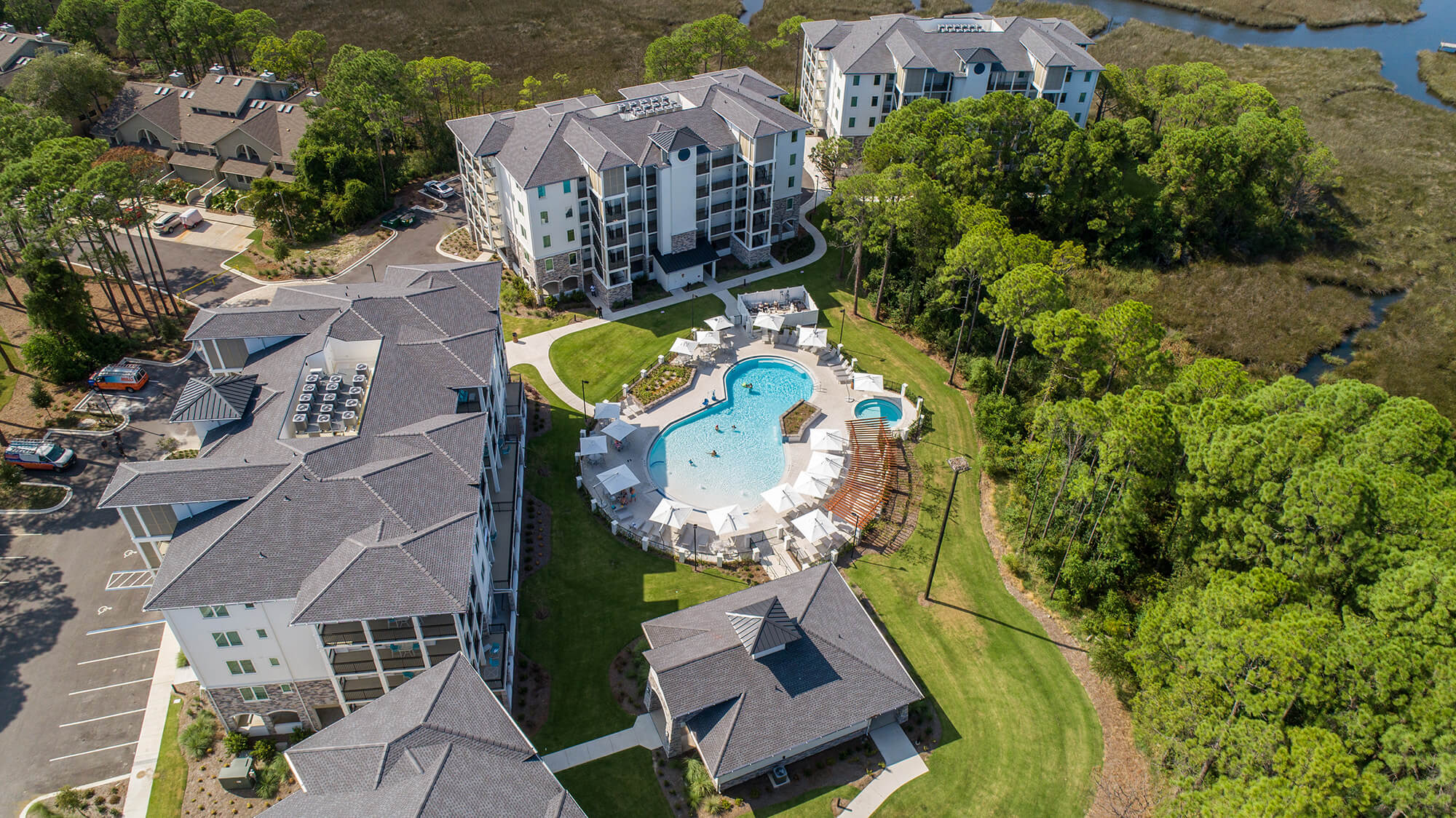An aerial view of Osprey Pointe, with a large communal pool